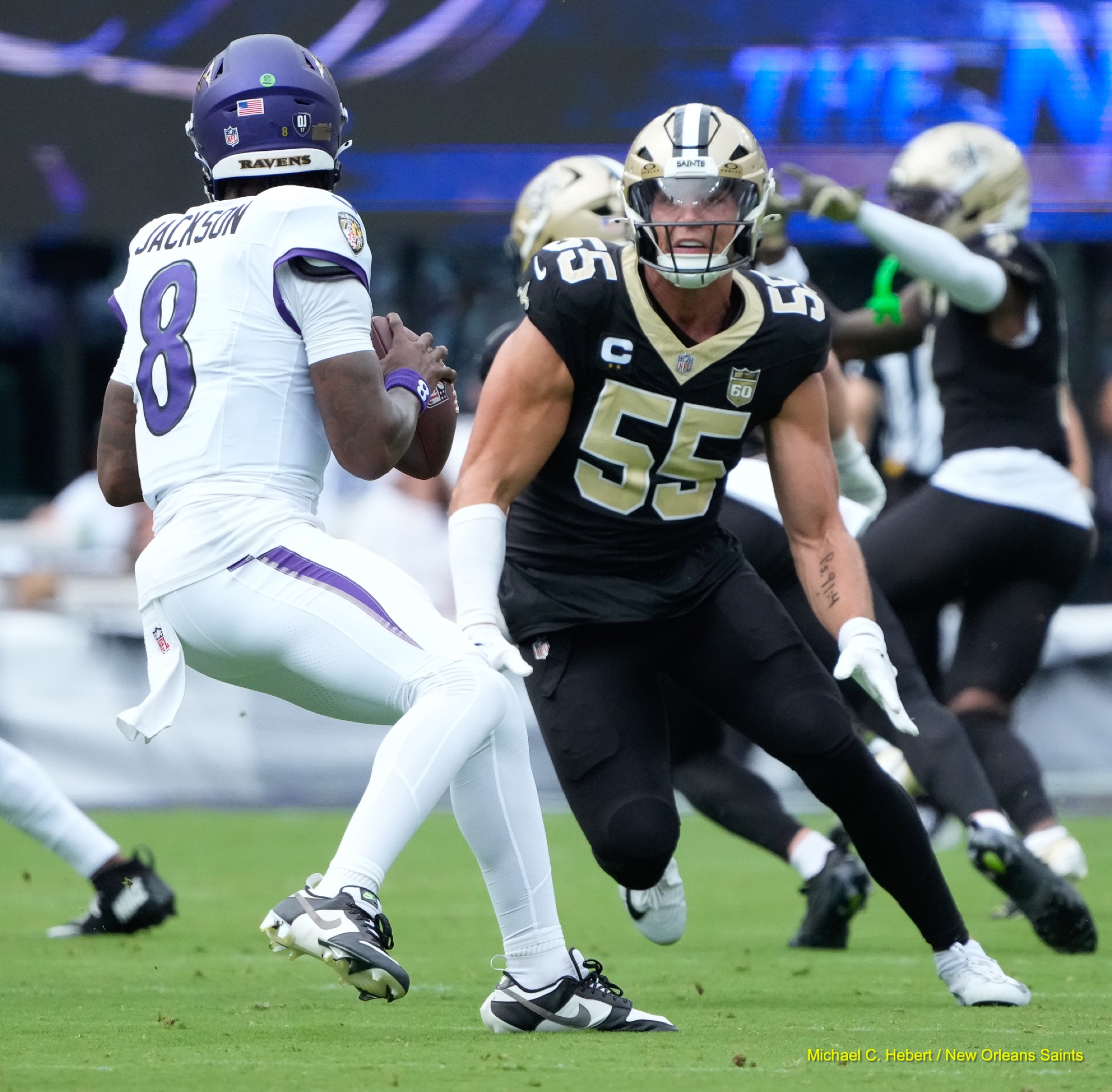 A New Orleans defender closes on Baltimore quarterback Lamar Jackson on September 20, 2026.