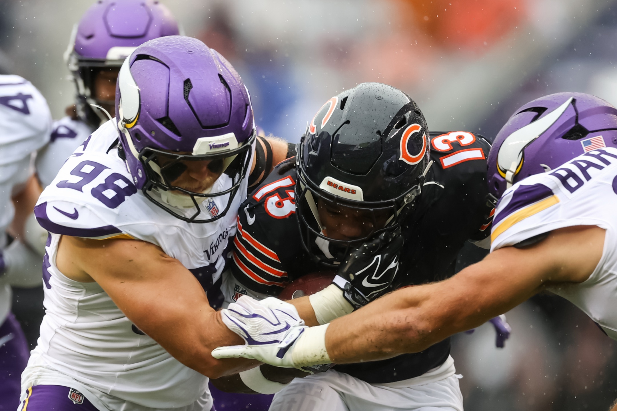 Minnesota defenders surround Chicago quarterback Caleb Williams at Soldier Field on September 20, 2026.